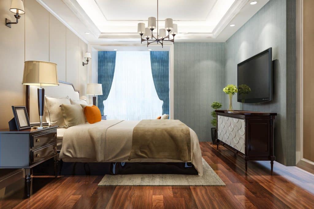 Carpet and Laminate Wood Flooring In Bedrooms