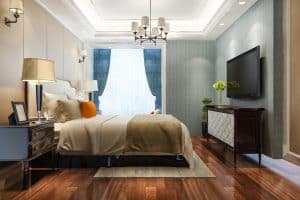 Carpet and Laminate Wood Flooring In Bedrooms